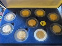 C8) National Collector’s Mint 9 piece 24kt gold p;