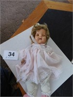 Sleepy eyed baby doll, 20" tall. with moveable