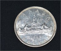 1962 CAD Silver Dollar Vouyager