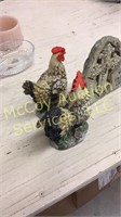 Polished stone rooster and chicken and lot