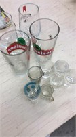Michelob, Budweiser and misc shot glasses plus a