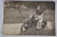 VINTAGE PHOTO OF GIRL ON MOTORCYLE w/ RACE SIGN