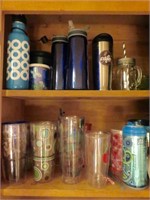 Cabinet Full of Travel Cups & Mugs