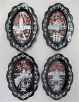 Four oval mother of pearl inlaid plaques