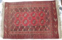 Quality red ground wool floor rug