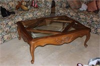 Nicely Carved Coffee Table with Inset Beveled Glas