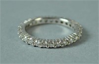 PLATINUM & DIAMOND ETERNITY RING, 0.86CTW