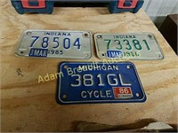 3 assorted motorcycle license plates