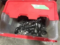Tote of PVC pipe Elbows