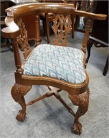 HIGHLY CARVED ORNATE UPHOLSTERED CORNER CHAIR