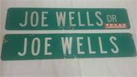 2 metal Joe Wells street signs