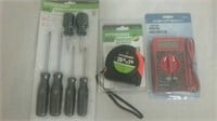 3 new tools tape measure electrical tester and