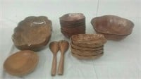 Large group of wooden bowls and serving set