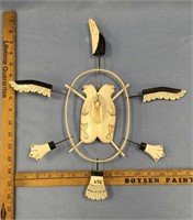 Ivory spirit mask, 15.5" represents a loon and sea