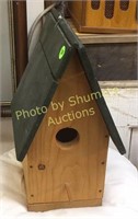Birdhouse with green roof