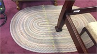Oval braided rug 65" x 42"