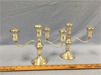 A pair of sterling silver candelabras         (2)