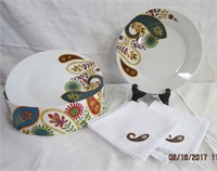 4 - 7.5" plates and 4 matching napkins in case