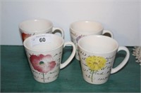 Four Ceramic Mugs with Painted Flower