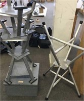 Three small stands and two free-standing aluminum