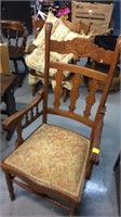 Older chair with cushion