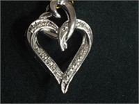 Sterling silver 8 Diamond Heart Shaped Pendant,