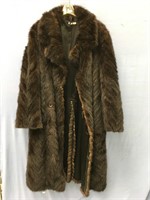 A fabulous mink coat, has minor damage on the slit
