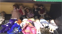 Group a lot of small dolls and a purple beanie