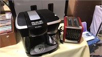 Keurig Lavazza coffee maker and a DeLonghi two