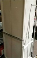Two door plastic storage cabinet with four shelves