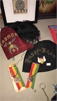 Two vintage Shriner hats and two vintage trainer