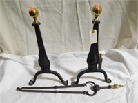 Pair of wrought iron andirons and coal poker