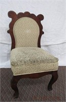 Carved back upholstered seat and back chair