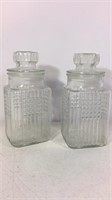 Two vintage glass candy jars
