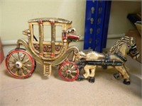 CAST IRON HORSE AND CARRIAGE ON A STAND