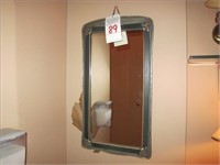 15" X 28" FRAMED MIRROR (LOCATED IN MENS ROOM)