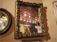 18" X 22" ORNATE FRAMED MIRROR (LOCATED IN THE