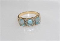 9ct yellow gold and blue topaz ring