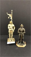 Two metal knight figurines