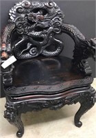 Incredible black carved Asian chair