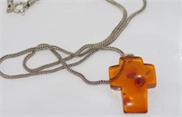 Amber cross on a heavy chain marked 925