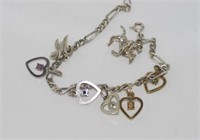 Silver charm bracelet with 9ct charms