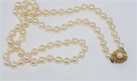 Matinee length string of cream coloured pearls