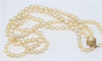 Double strand baroque pearls with 9ct gold clasp