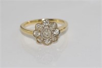 18ct yellow gold, 9 diamond daisy cluster ring