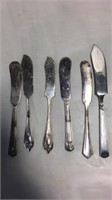 Lot of six antique butter/cheese knives