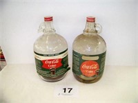 Two glass gallon jugs - Coca Cola syrup -