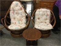 Pair of rattan chairs with shell print cushions,