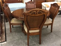 Round carved base table and four chairs
