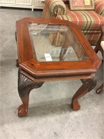 Glass top end table with ball and claw foot